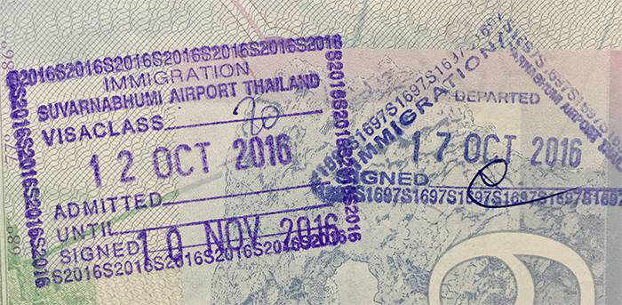 Thai entry and exit stamps on passport
