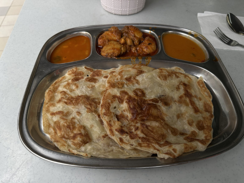 Roti Canai with Curry Chicken Kuala Lumpur Malaysia